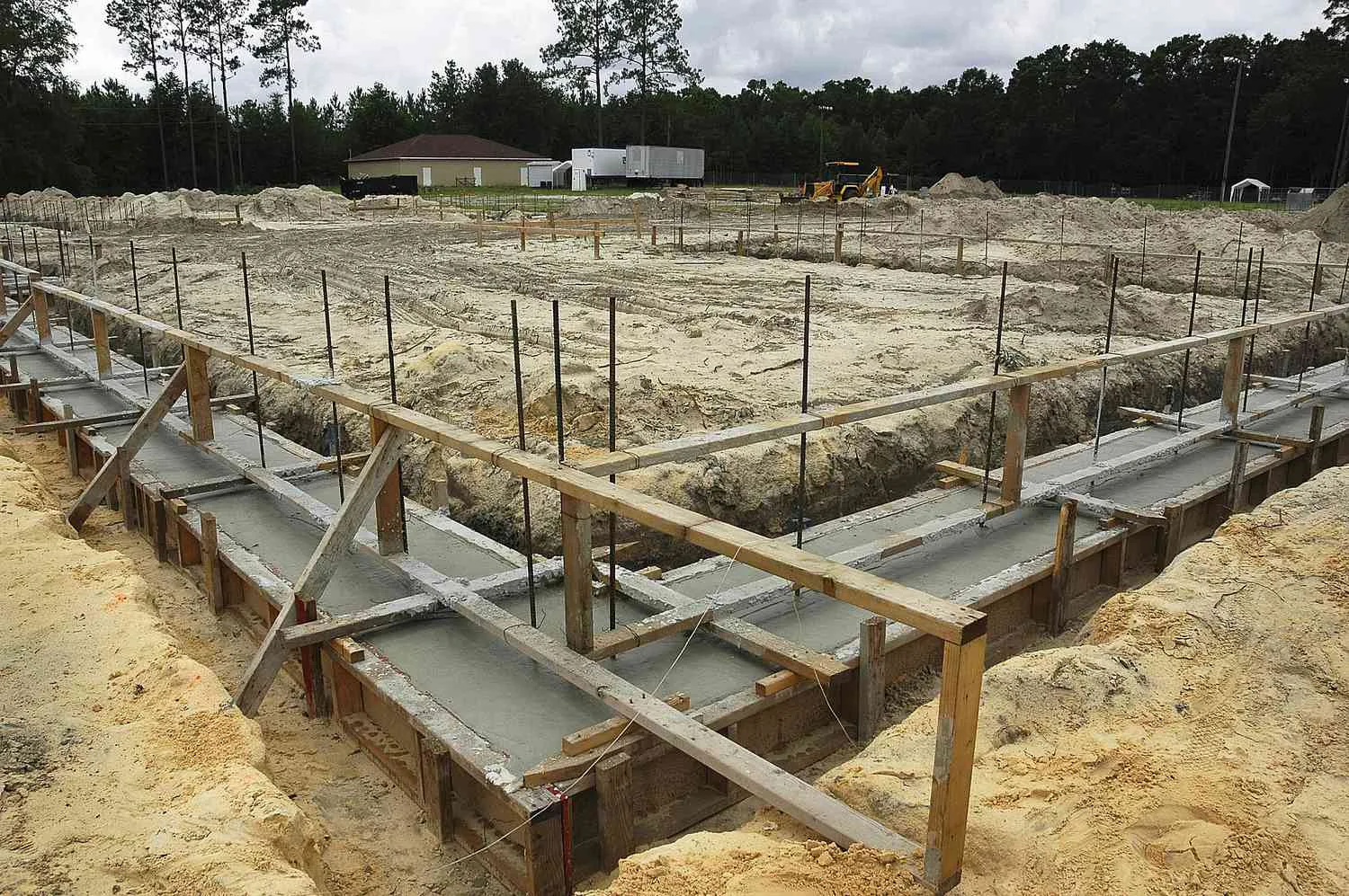 Concrete footing formwork and reinforcement at a construction site